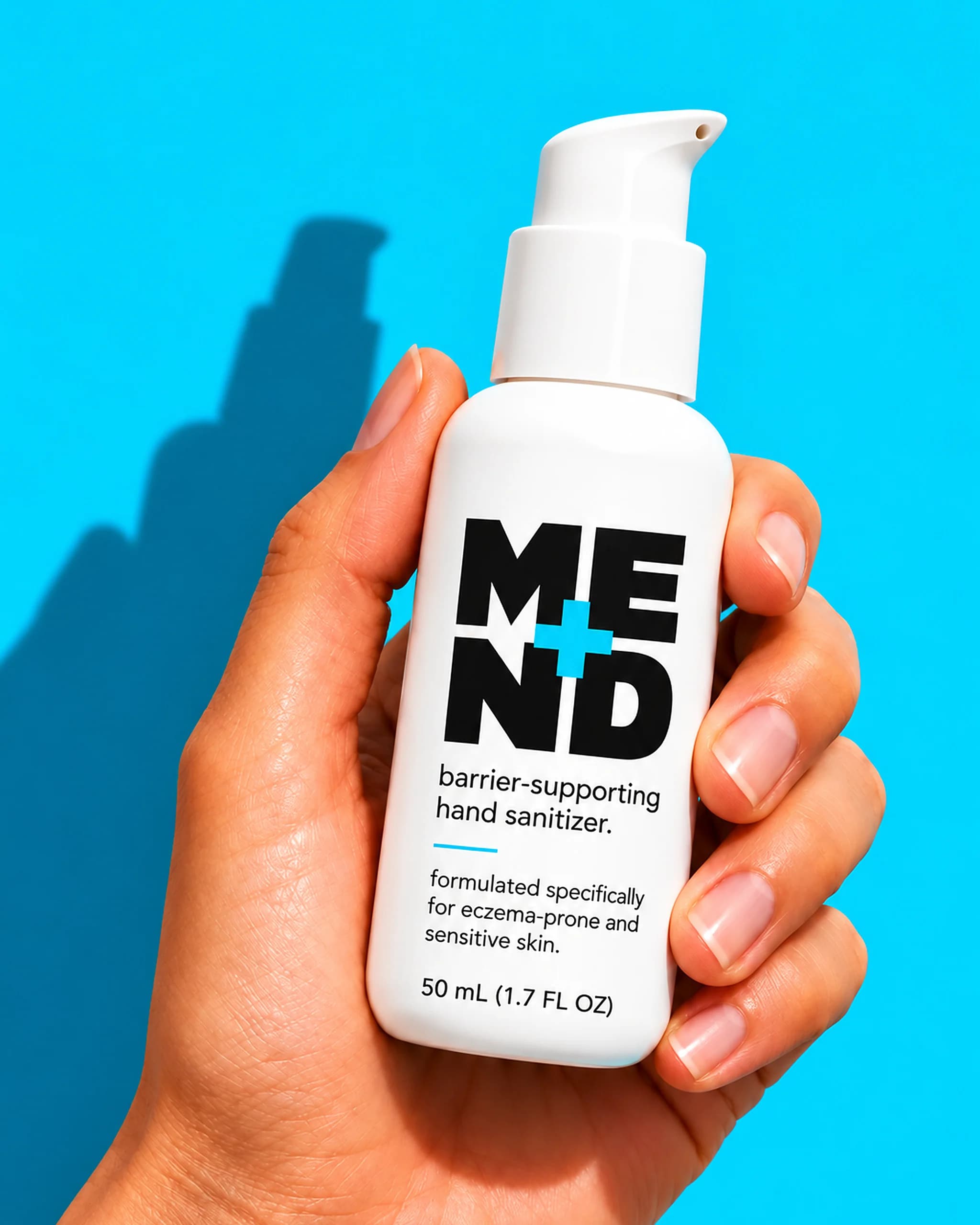 MEND+ barrier-supporting hand sanitizer held in hand